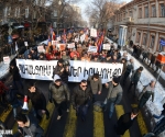 Activists protesting against the compulsory accumulative pension payments system hold a protest march after the rally on Freedom Square
