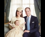 STRICTLY EMBARGOED UNTIL 2200 hrs BST THURSDAY OCTOBER 24TH 2013HIGHER FEES APPLY. STRICTLY EDITORIAL USE ONLY.The official portrait for the christening of Prince George Alexander Louis of Cambridge, photographed in The Morning Room at Clarence House in London on October 23rd 2013. PICTURED: HRH Duke of Cambridge, HRH Duchess of Cambridge with their son HRH Prince George. Prince George is wearing an outfit made of delicate Honiton lace and white satin by Angela Kelly, an exact replica of the one worn before him by every baby born to the British Royal family since 1841. The Duchess is wearing Alexander McQueen dress and a Jane Taylor hat.