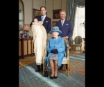 STRICTLY EMBARGOED UNTIL 2200 hrs BST THURSDAY OCTOBER 24TH 2013HIGHER FEES APPLY. STRICTLY EDITORIAL USE ONLY.The official portrait for the christening of Prince George Alexander Louis of Cambridge, photographed in The Morning Room at Clarence House in London on October 23rd 2013. PICTURED: Four generations of the British Royal Family photographed together in over a generation: HM Queen Elizabeth II, HRH Prince of Wales and HRH Duke of Cambridge carrying HRH Prince George. Prince George is wearing an outfit made of delicate Honiton lace and white satin by Angela Kelly, an exact replica of the one worn before him by every baby born to the British Royal family since 1841.